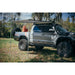 Rooftop awning attached to roof rails on a Toyota Tacoma truck