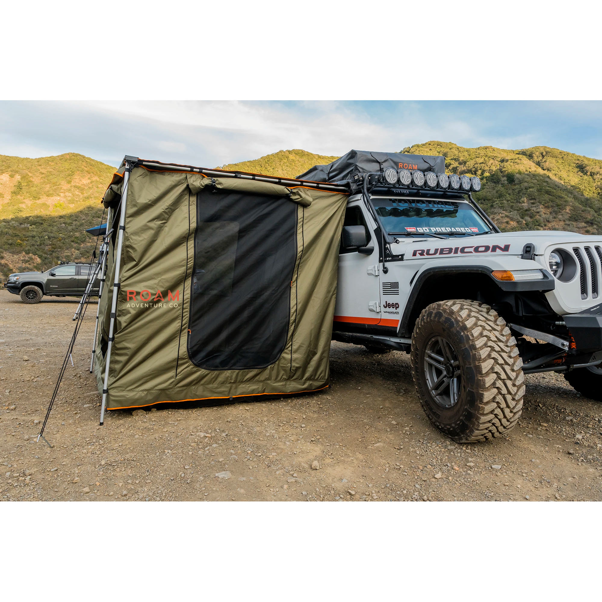 ROAM Adventure Co. Rooftop Awning Room in Forest Green shown on a Jeep Rubicon